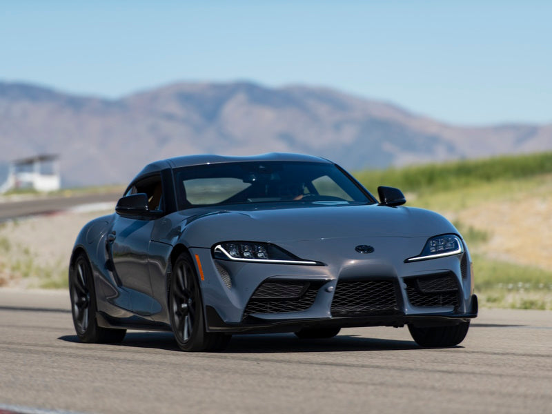 Toyota Supra A90 driving on track